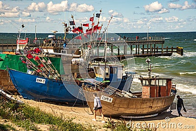Fishing boats on the Baltic beach in ChÅ‚opy(West Pomeranian Voivodeship). Editorial Stock Photo
